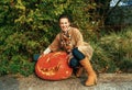 Woman showing huge Halloween pumpkin Jack OÃ¢â¬â¢Lantern Royalty Free Stock Photo